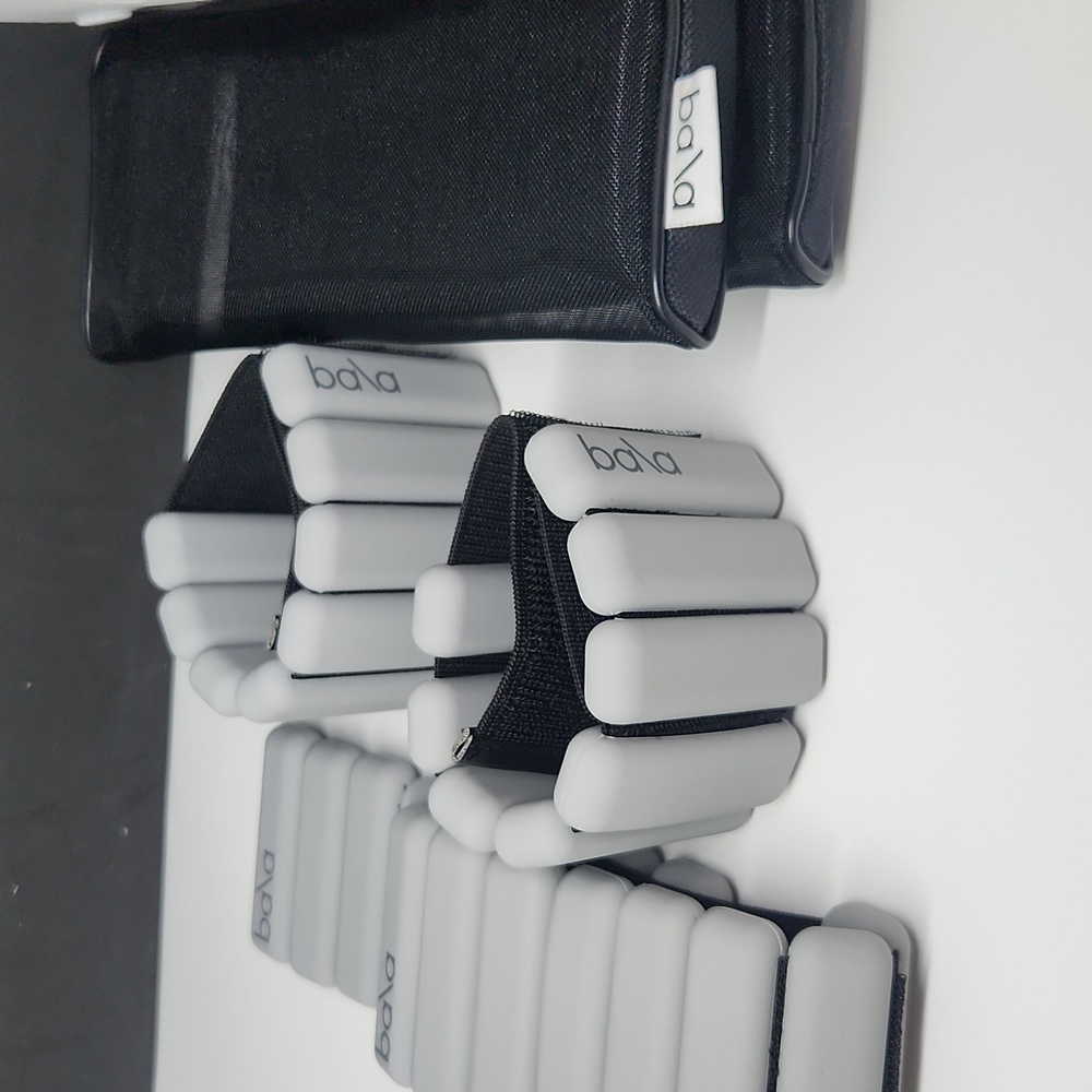 2 pairs of light grey bala bangles 1 lb. Each